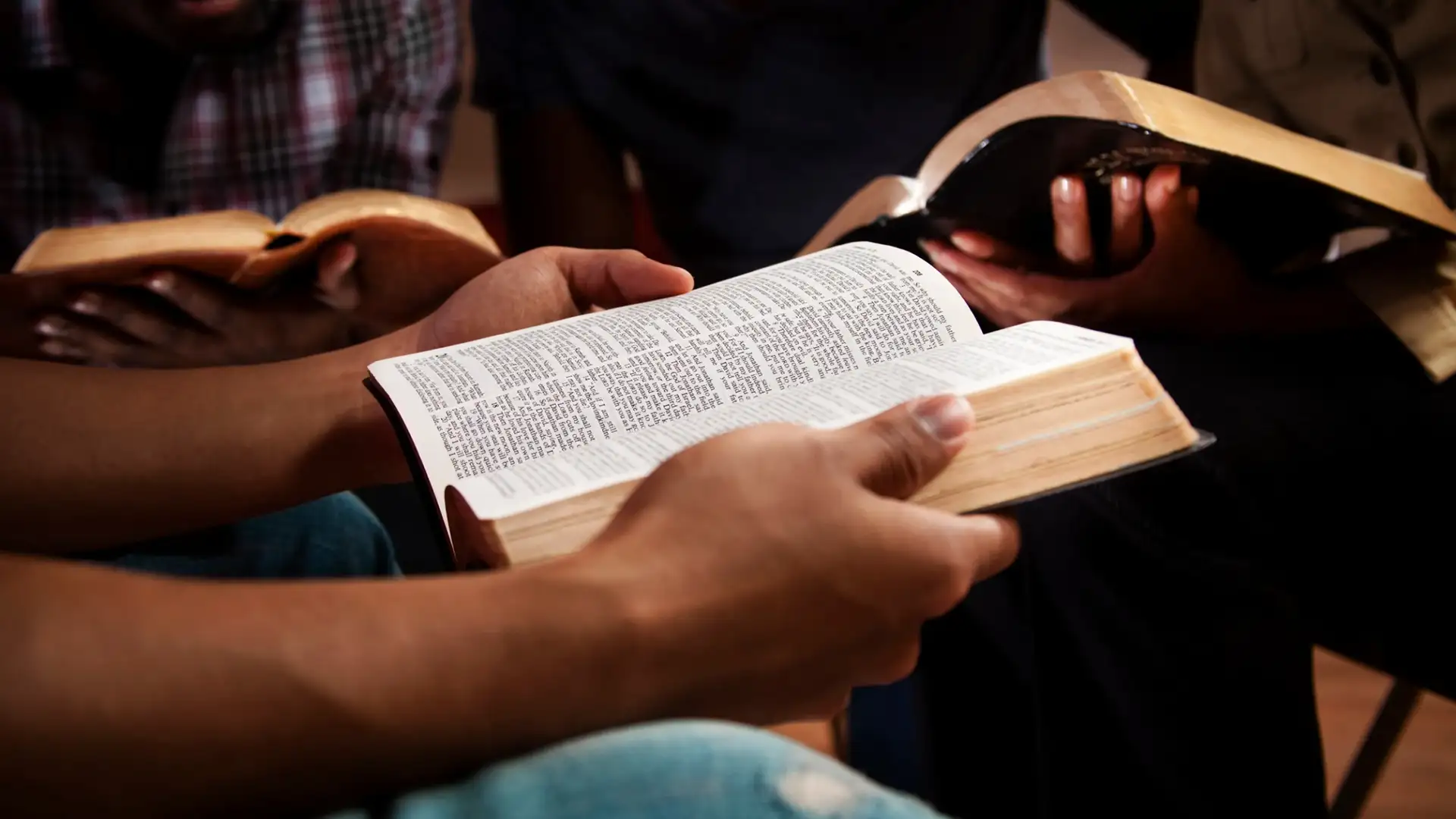 Man with bible open 