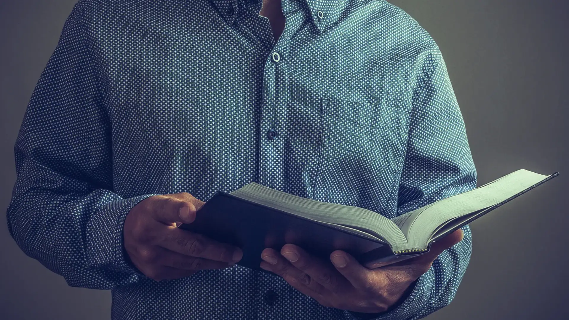 Man holding a bible