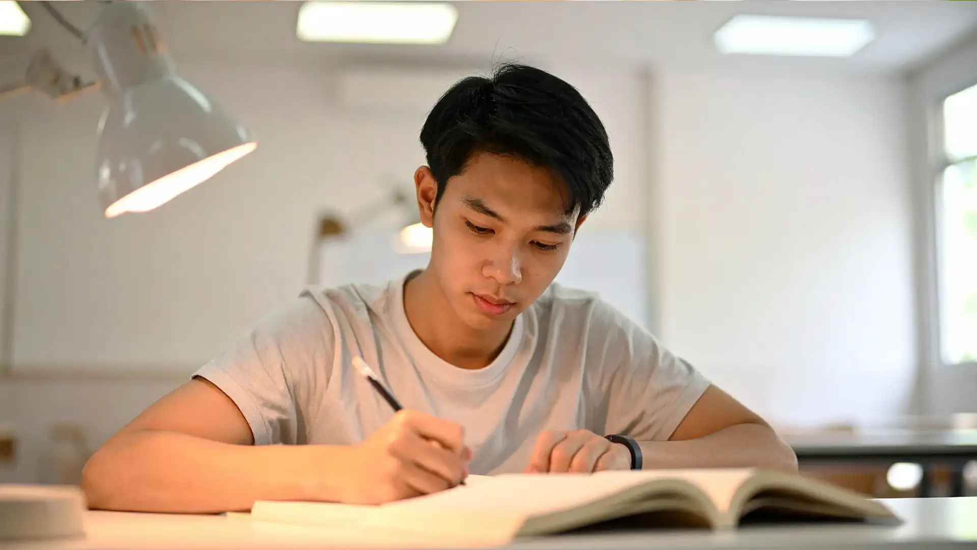 Man studying in a classroom